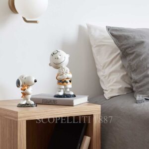 lladro snoopy and charlie brown figurine