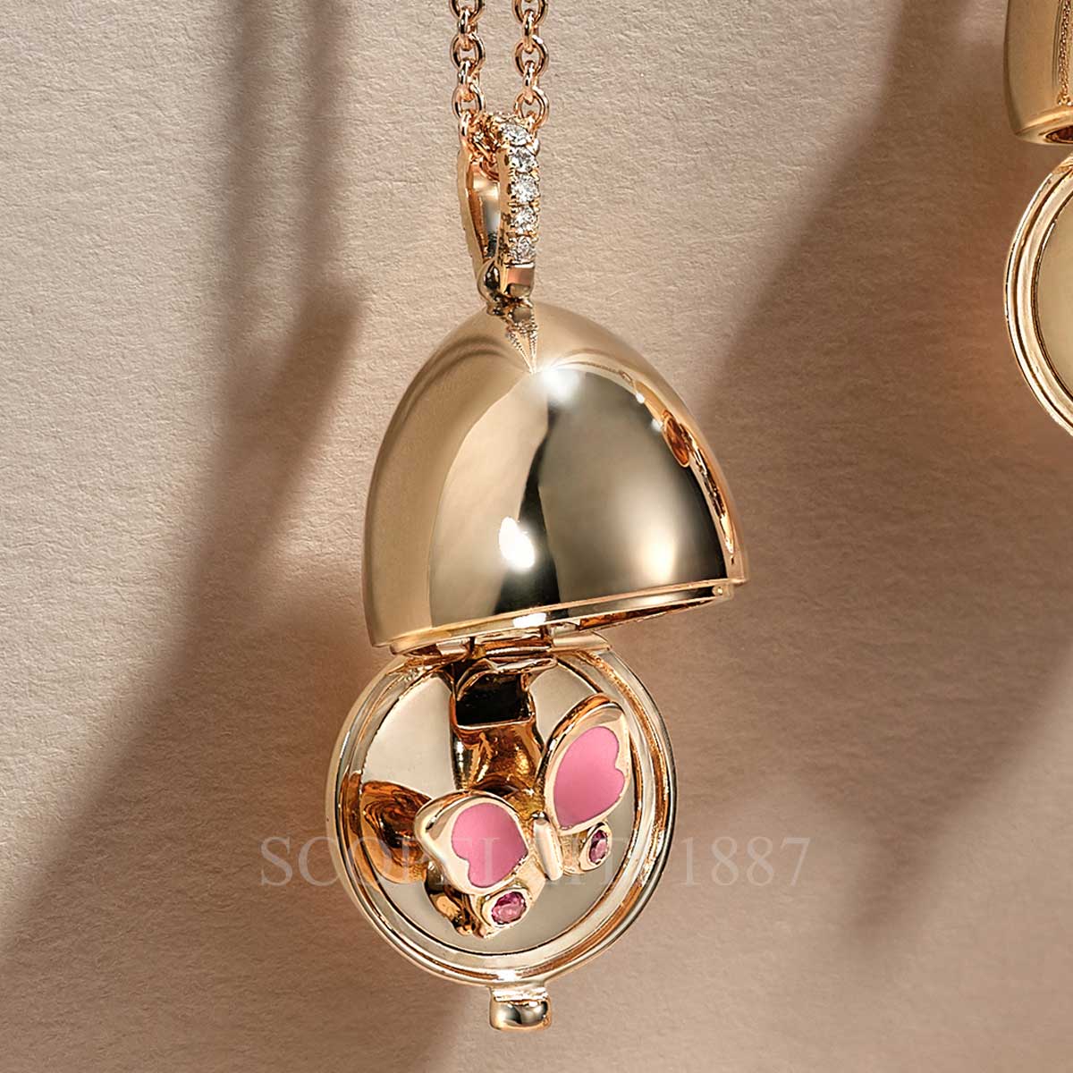 faberge egg pendant with butterfly secret locket
